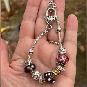 Multi Bead Multi Color Charm Bracelet. Glass beads and silver color bead…